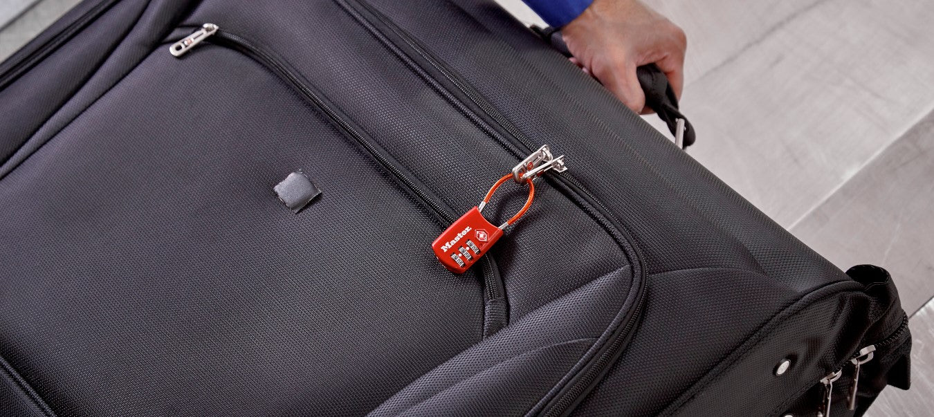 4688d silver luggage lock on blue suitcase